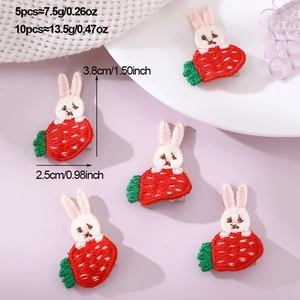 Detail view of five embroidered rabbit hair clips with dimensions and weight measurements