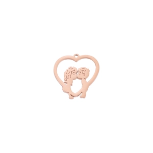 Macro shot of rose gold heart pendant featuring a kissing boy and girl silhouette