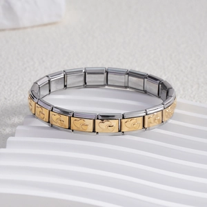 Italian charms elastic bracelet in two-tone stainless steel with golden heart patterns