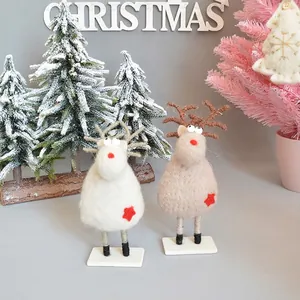 Felt reindeer Christmas ornaments with wooden base in white and brown colors