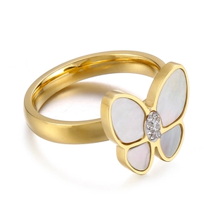 Elegant gold butterfly ring with white shell wings and sparkling zircon accents