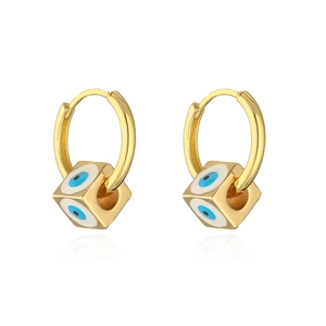 Close-up of 18K gold-plated hoop earrings with blue evil eye enamel cube charms