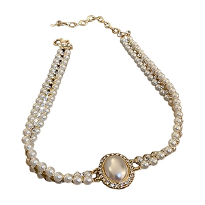 Collier double rang à perle baroque ovale avec strass et chaîne dorée ajustable