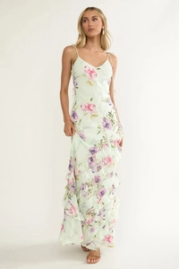 Detail of floral maxi dress showing ruffled layers and delicate spaghetti straps