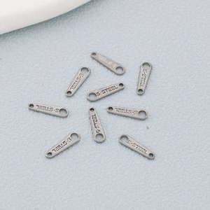 Flat oval stainless steel jewelry tags with S.STEEL engraving for DIY necklaces