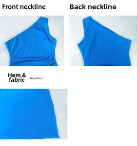 Detail view of the elegant one shoulder neckline and satin fabric hem on the blue dress
