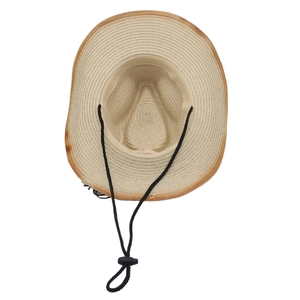 Top view of woven straw cowboy hat with frayed edges and adjustable black chin strap