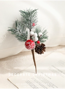 Detailed Christmas frosted red berries and snow-covered pine needles for home decor