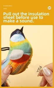 Detail showing how to pull the insulation sheet to activate the bird sound cat toy