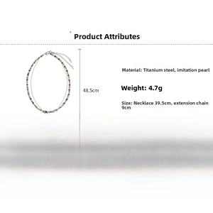 Detail showing titanium steel flower pendant and beaded necklace with extension chain