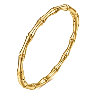 Polished gold bamboo joint bangle made of stainless steel with a magnetic clasp closure
