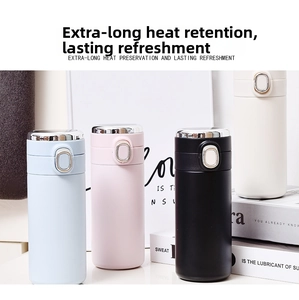 Detailed view of four insulated stainless steel bottles with matte finish and flip lids