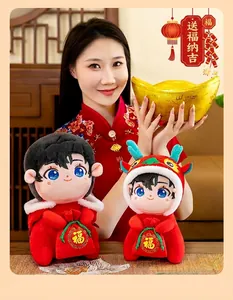 Detailed view of traditional Chinese New Year dragon year mascot plush dolls in red