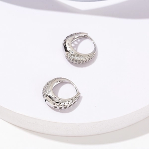Luxury 18K gold plated hollow heart-shaped hoop earrings with sparkling crystals for women