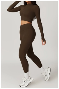 Detail view of chocolate high waist yoga set with thumb hole sleeves and half zip top