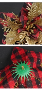 Macro detail of red plaid Christmas flower petals with gold glitter and green back clip
