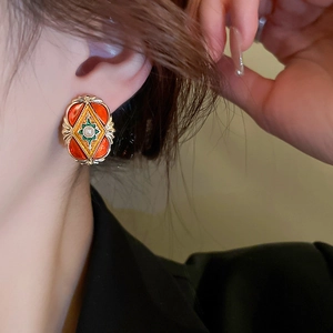 French vintage orange enamel earrings with gold trim and central pearl for women