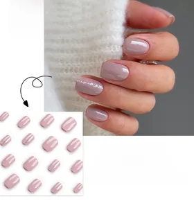 Short square press-on nails in dusty pink with subtle silver glitter accents