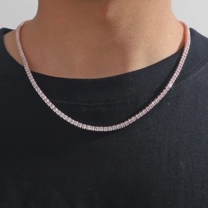 Close-up of rose gold tennis necklace with square cut zircon stones on neck