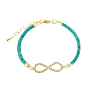 Infinity knot braided rope bracelet in turquoise with gold hardware and white zircons
