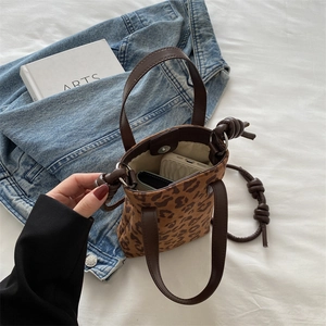 Trendy leopard print crossbody bag with leather trim and canvas, stylish mini square purse