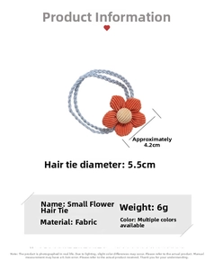 Dettaglio elastico blu da 5,5cm con fiore in velluto a coste arancione da 4,2cm per capelli