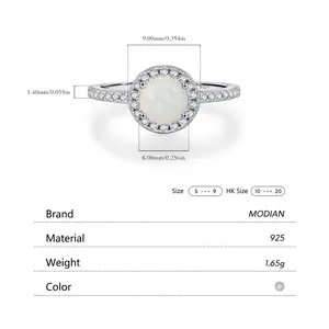 S925 sterling silver ring featuring a round white opal and pavé-set zirconia stones