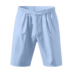 Detail of light blue linen shorts featuring adjustable drawstring and elastic waistband