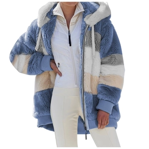 Close-up of cozy fleece patchwork hooded jacket with multi-color blocks and zipper detail