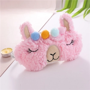 Pink plush alpaca sleep mask with colorful pom-poms and soft fleece material