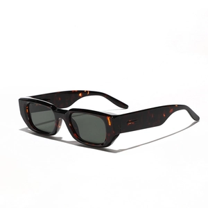 Retro square tortoiseshell sunglasses with dark gray lenses in a stylish 45-degree side view