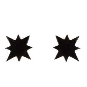 Detail shot of matte black octagonal star stud earrings made of stainless steel