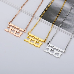 Detailed view of 555 angel number necklaces in rose gold, gold, and silver stainless steel