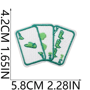 Detailed dimensions of playing card embroidered patch with green wave surfing design