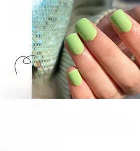 Matte avocado green press-on nails set showing both loose pieces and hand application