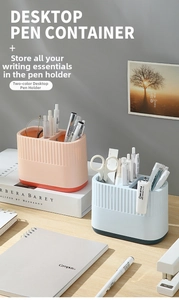 Close-up of dual-slot desk organizer with striped texture in pink and light blue
