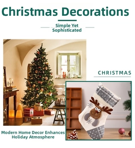 Detailed view of off-white knitted Christmas stocking with 3D reindeer decor and plaid accents