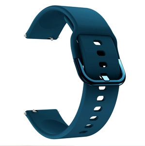 Detailed view of dark blue silicone watch strap with ventilation holes and metal buckle