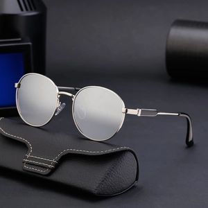 Classic silver round frame sunglasses with grey lenses and black leather texture case