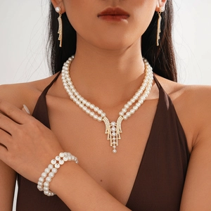 Three-piece pearl jewelry set with double-layer necklace, bracelet and tassel earrings