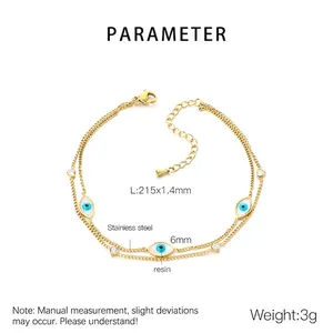 Detail view of double-layer stainless steel anklet with resin evil eye and turquoise beads