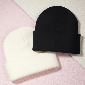 Winter rib-knit beanies in black and beige with a wide cuff design for daily warmth