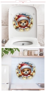 Detail of Christmas cartoon bear sticker applied on toilet lid and kitchen wall surfaces