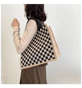 Close-up of checkerboard linen tote bag showing fabric texture and large capacity
