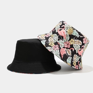 Reversible bucket hat with flamingo tropical floral print and solid black design