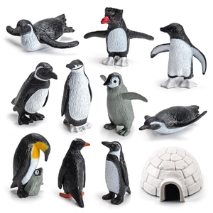 Realistic penguin animal toy set with various figurines and a white igloo model