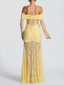 Detail of elegant off-shoulder lace sleeves and ruched mermaid hem on a pale yellow maxi dress
