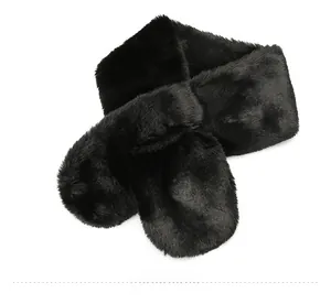 Detail view of the soft black plush faux fur scarf showing the fluffy texture and clip