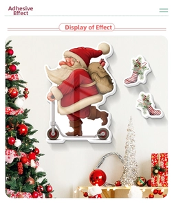 Detail of Christmas wall stickers featuring Santa on a scooter and festive stockings