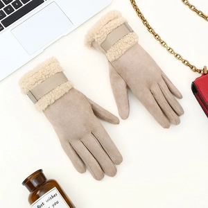 Detail of khaki suede winter gloves with plush fleece trim and metallic buckle design